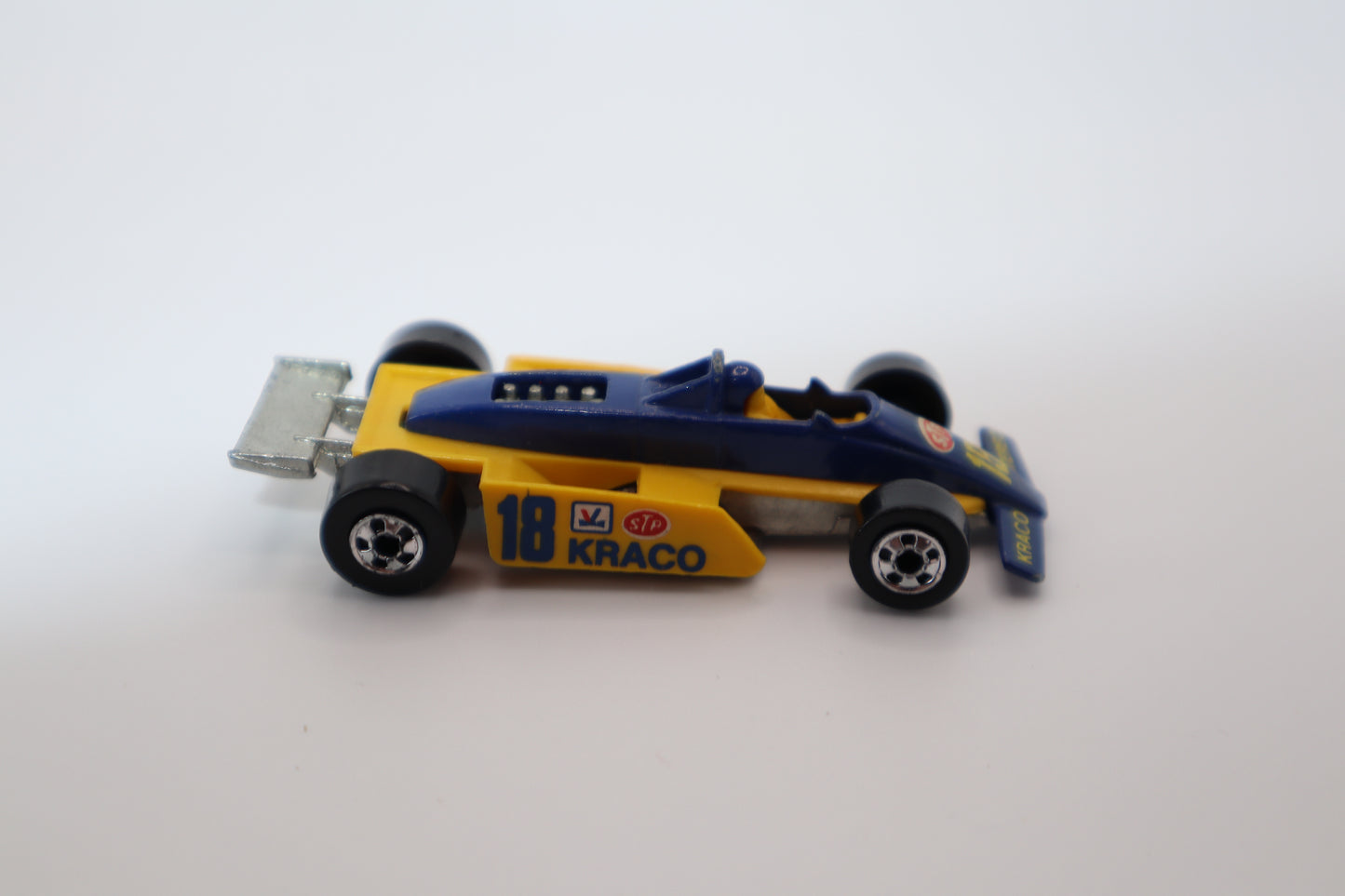 Hot Wheels 1982 #18 Kraco Race Car 18 STP. Condition is Used.