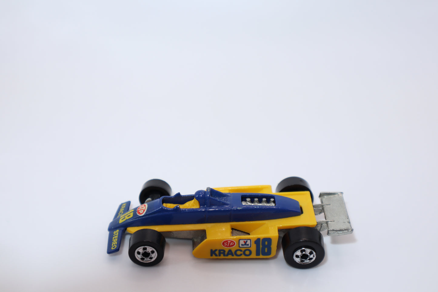 Hot Wheels 1982 #18 Kraco Race Car 18 STP. Condition is Used.